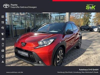 Gebraucht Toyota Aygo X Pulse 72 PS (52 kW) 2023 Chili red / night sk (rot) SUV
