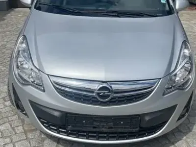 Używany Opel Corsa 87 KM (63 kW) 2012 Srebrny Hatchback