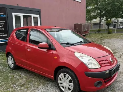 Gebraucht Nissan Pixo Acenta 68 PS (50 kW) 2011 Bright red (s) Kleinwagen