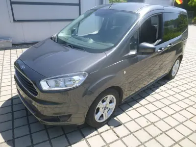 Gebraucht Ford Tourneo Courier Trend 101 PS (74 kW) 2015 Grau Van / Kleinbus