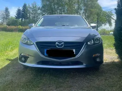 Używany Mazda 3 Center-Line 120 KM (88 kW) 2014 Srebrny Sedan/Limuzyna