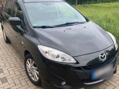 Gebraucht Mazda 5 116 PS (85 kW) 2011 Schwarz Van / Kleinbus