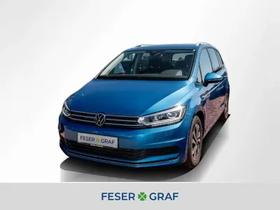 Gebraucht VW Touran Active 150 PS (110 kW) 2023 Caribbean blue metallic Van / Kleinbus