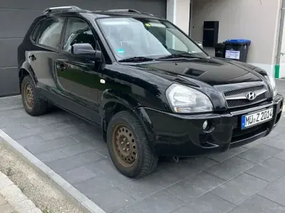 Gebraucht Hyundai Tucson 141 PS (103 kW) 2010 Schwarz SUV