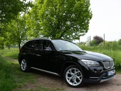 Używany BMW X1 Exclusive 184 KM (135 kW) 2012 Czarny SUV