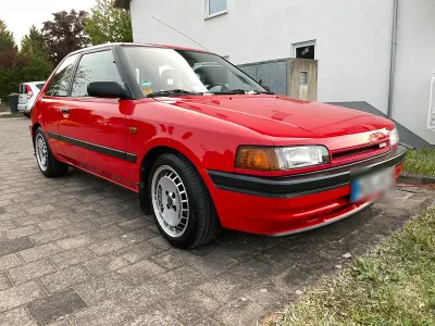 Gebraucht Mazda 323 84 PS (61 kW) 1989 Rot Kleinwagen