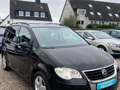 Second-hand VW Touran United 140 CP (102 kW) 2008 Negru Monovolum