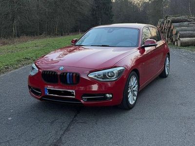 Second-hand BMW 118 Sport Line 170 CP (125 kW) 2011 Roșu Hatchback