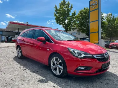 Gebraucht Opel Astra Dynamic 160 PS (117 kW) 2016 Powerrot/red (metallic) Kombi