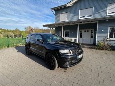 Second-hand Jeep Grand Cherokee Summit 250 CP (183 kW) 2013 Negru SUV