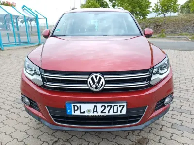 Używany VW Tiguan 140 KM (102 kW) 2014 Czerwony SUV