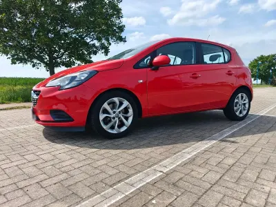 Używany Opel Corsa 90 KM (66 kW) 2016 Czerwony Hatchback