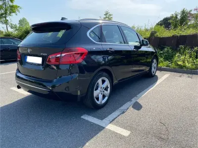 Gebraucht BMW 218 Active Tourer Luxury Line 136 PS (100 kW) 2014 Schwarz Van / Kleinbus