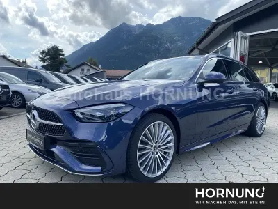 Gebraucht Mercedes C300e AMG 313 PS (230 kW) 2026 Sodalithblau metallic Kombi