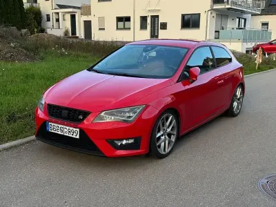 Używany Seat Leon SC FR 179 KM (131 kW) 2013 Czerwony Hatchback