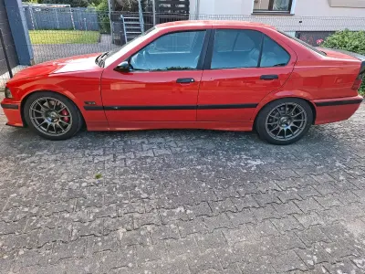 Gebraucht BMW 330 231 PS (169 kW) 1995 Rot Limousine