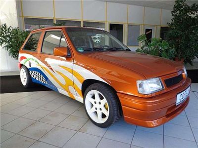 Second-hand Opel Corsa 98 CP (72 kW) 1991 Portocaliu Berlinǎ
