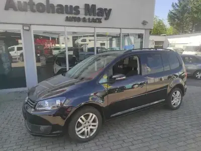 Begagnad VW Touran Comfortline 105 HK (77 kW) 2012 Svart Minibuss