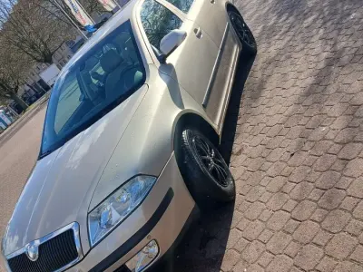 Używany Skoda Octavia 140 KM (102 kW) 2004 Żółty Kombi