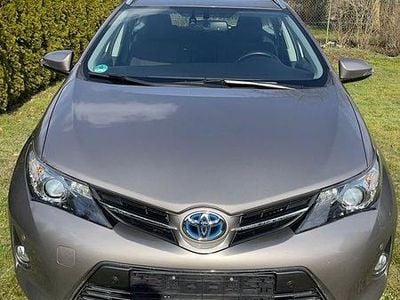 Gebraucht Toyota Auris Hybrid 99 PS (72 kW) 2013 Braun Kombi