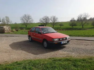 Gebraucht Mazda 323 60 PS (44 kW) 1987 Rot Limousine