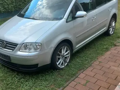 Gebraucht VW Touran 105 PS (77 kW) 2006 Silber Van / Kleinbus