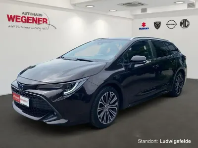 Gebraucht Toyota Corolla Hybrid Team 152 PS (111 kW) 2022 Phantom brown metallic Kombi