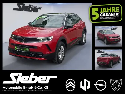 Używany Opel Mokka Edition 101 KM (74 kW) 2023 Czerwony SUV