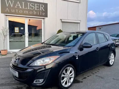 Używany Mazda 3 90th Anniversary 105 KM (77 kW) 2011 Czarny Sedan/Limuzyna