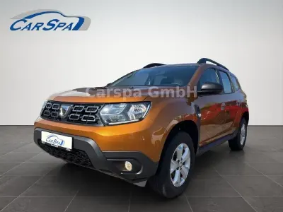 Używany Dacia Duster Comfort 101 KM (74 kW) 2020 Pomarańczowy SUV