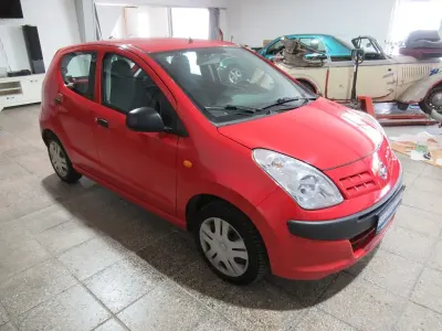 Gebraucht Nissan Pixo Acenta 68 PS (50 kW) 2010 Rot Kleinwagen