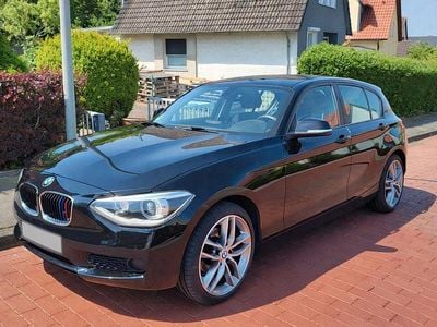 Second-hand BMW 114 Advantage 102 CP (75 kW) 2014 Negru Hatchback