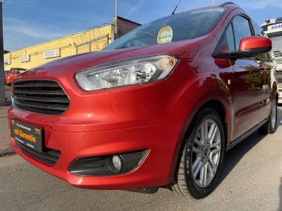 Gebraucht Ford Tourneo Courier 101 PS (74 kW) 2016 Orange Van / Kleinbus
