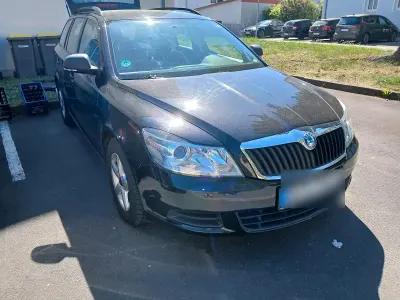 Używany Skoda Octavia 105 KM (77 kW) 2011 Czarny Kombi