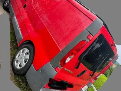 Gebraucht Renault Trafic 115 PS (84 kW) 2011 Rot Van / Kleinbus