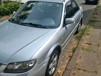 Gebraucht Mazda 323 98 PS (72 kW) 2003 Grau Limousine