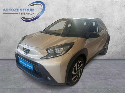 Gebraucht Toyota Aygo X Pulse 72 PS (52 kW) 2023 Ginger beige (4u9)/ black mica SUV