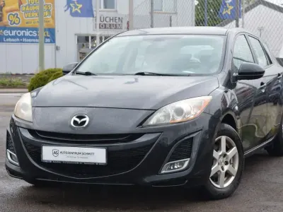 Używany Mazda 3 Edition 105 KM (77 kW) 2011 Czarny Sedan/Limuzyna