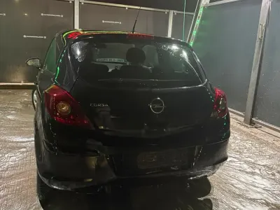 Używany Opel Corsa 80 KM (58 kW) 2010 Czarny Hatchback