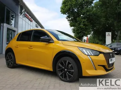 Gebraucht Peugeot e-208 GT 100 kW (136 PS) 2023 Faro gelb (metallic) Kleinwagen