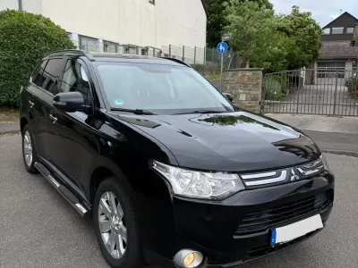 Begagnad Mitsubishi Outlander 150 HK (110 kW) 2013 Svart SUV