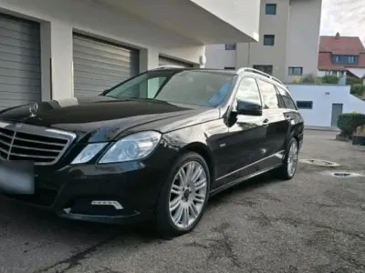 Second-hand Mercedes E200 136 CP (100 kW) 2011 Negru Break