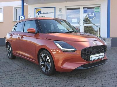 Gebraucht Suzuki Swift Comfort+ 83 PS (61 kW) 2025 Flame orange pearl met. Kleinwagen