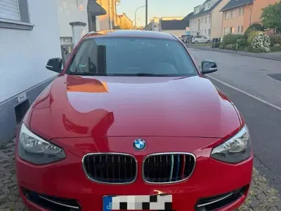 Używany BMW 116 Sport Line 136 KM (100 kW) 2012 Czerwony Hatchback