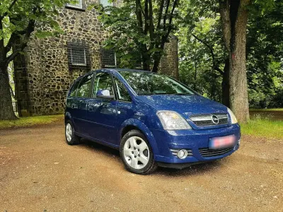 Używany Opel Meriva 92 KM (67 kW) 2009 Niebieski Minivan