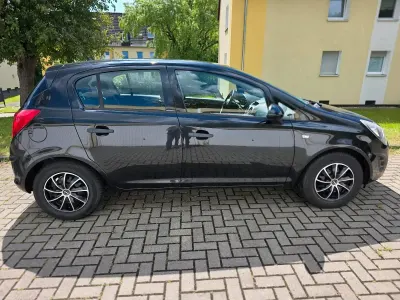 Gebraucht Opel Corsa 70 PS (51 kW) 2014 Schwarz Kleinwagen