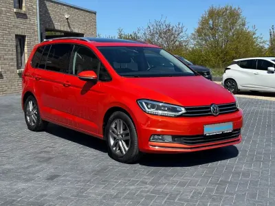 Używany VW Touran Sound 150 KM (110 kW) 2017 Pomarańczowy Minivan