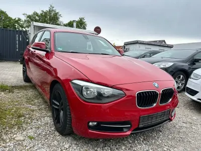 Gebraucht BMW 118 Sport Line 143 PS (105 kW) 2012 Rot Kleinwagen