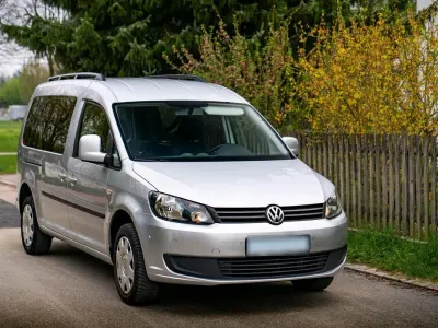 Używany VW Caddy Maxi 105 KM (77 kW) 2014 Srebrny Minivan