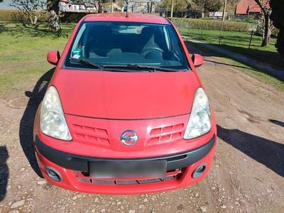 Second-hand Nissan Pixo 68 CP (50 kW) 2010 Roșu Hatchback